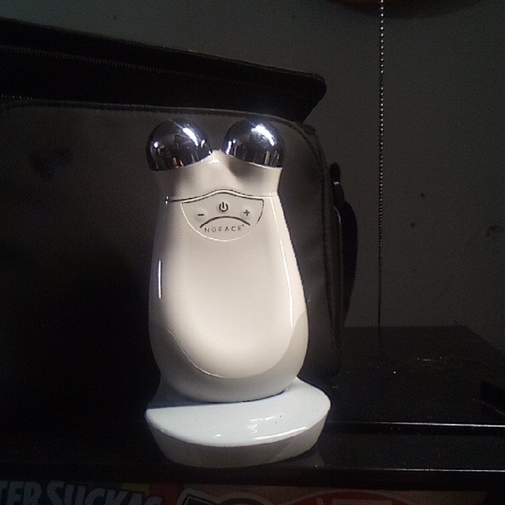 Get Ride Of Wrinkles With NuFACE White Toning Device with Silver Accents